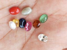 Stone : Natural and Precious ~ Ruby , Emerald , Coral , Yellow Sapphire , Blue Sapphire , Cat's Eye , Pearl , Hessonite , Zircon. Grade : AAA+ Size : 5x7 mm Shape : Oval (faceted, Except pearl, coral and cats eye) Color : Multi-Color Weight : 8.5 Gemstone are made in Billions of Years in the Womb of Earth. Gemstones connect us widely to the universe and spirits. All the photographs of the item are captured in natural daylight. The photographs are uploaded without any enhancements or editing. All Oval Gemstones With Accents For Jewelry Making, Oval Multicolor Gemstones With Accents, Oval Stones For Jewelry Making, Oval Gemstone Beads And Cabochons For Gifts, Cat Eye Colors, Luxury Colorful Oval Beads, Gems, And Cabochons, Traditional Multicolor Polished Beads, Gems, And Cabochons, Multicolor Multi-stone Beads Gems And Cabochons For Gifts, Elegant Multicolor Oval Beads, Gems, And Cabochons