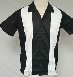 These 100% cotton shirts from Rockabilly Fashions are excellent quality with replica cut and features that 50s era shirts have such as the small vents on sides and contrast panels on the front. This version is black and white.  Great for the summer as they have short sleeves and open collar. Striking stage wear for bands or for dancing.   Design and cut of the shirt are authentic to the 50s vintage look. Choice of sizes S (40" chest), M (42" chest), L (44" chest), XL (46" chest), XXL (48" chest) Retro Short Sleeve Shirt, Retro Black Collared Shirt, Retro Black Shirt For Summer, Retro Black Summer Shirt, Black Short Sleeve Retro Shirt, Retro Short Sleeve Shirt With Camp Collar, Retro Black Camp Shirt With Camp Collar, Retro White Short Sleeve Shirt With Camp Collar, White Retro Short Sleeve Shirt With Camp Collar