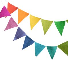 multicolored felt buntings hanging on a white background