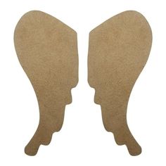 two pieces of cardboard with the shape of an angel's wings cut out from it