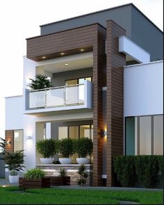 this is an image of a two story house with balconies on the second floor