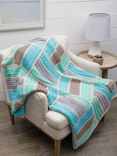 a couch with a blanket on top of it