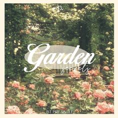 the garden series is on display in front of some pink flowers and green trees with white lettering