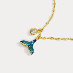 Do you like mermaid tail jewelry? Do you want a 18k gold chain? Just get Mermaid Tail Necklace, a piece of natures jewelry. This is a special necklace from Selenichast jewelry store. Get your tail to the beach with this Mermaid Tail Necklace. This necklace features a hand-enamelled mermaid tail in the centre and a gemstone suspended from the chain. Each elements has been carefully hand curved and adorned to bring the lovely creature to life. Why not wear it and show everyone your connection to t Mermaid Tail Necklace, 18k Gold Chain, Special Necklace, Lovely Creatures, 18k Gold Necklace, Ocean Jewelry, Enamel Necklaces, Mermaid Tail, Nature Jewelry