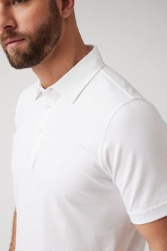 Raffi Aqua Collection The Sherwood aqua cotton polo shirt is the ultimate summer golf shirt. Perfectly paired with shorts or pants, the Sherwood is a timeless classic polo that is your grab and go shirt. A must-have in every man's wardrobe. Buy now and enjoy free domestic shipping with qualifying orders. 100% Aqua Cotton White Breathable Cotton Polo Shirt, White Casual Polo Shirt With 4-way Stretch, White Polo Collar Cotton T-shirt, Summer Golf, White Moisture-wicking Golf Polo Shirt, Moisture-wicking Short Sleeve Golf Polo Shirt, Every Man, Cotton Polo Shirt, Cotton Polo