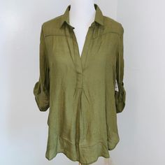 Charlotte Russe Split Back Top With Tortoise Button Detailing On Back And Sleeve. Olive Green 3/4 Sleeve. Nwt Size Large. Bustform Is A Size 8 For Reference. Offers Welcome, Trades. Green Button-up Blouse For Beach, Green Vacation Blouse With Button Closure, Versatile Green Tops For Beach, Green Blouse With Button Closure For Vacation, Green Summer Top With Roll-up Sleeves, Olive Button-up Summer Top, Green Summer Tops With Roll-up Sleeves, Olive Button-up Top For Summer, Green Blouse With Roll-up Sleeves For Spring