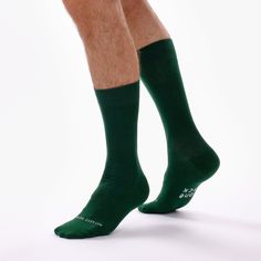 Two individual socks in dark green. Don't forget! If you lose one, you can always find the missing one! Product Details: Each and every sock we make is crafted for comfort and style. We weave our socks with 200 needles, the highest gauge used on socks. Due to the density of this weave, our socks are not only finer but also stronger than your average pair. Finally, our socks are all finished with a honeycomb welt, to give a more comfortable, flexible fit around the calf. Missing Socks, Water Footprint, Charity Water, Heels Patterns, Green Socks, The Missing, Combed Cotton, Mid Calf, Honeycomb