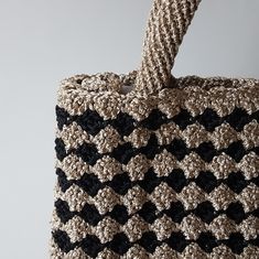 "This is an elegant top handle crochet bag suitable for both everyday and evening use. Made from shiny polyester macramé yarn, it has a unique shiny look to it.  It is lined with a shiny satin-like fabric and has an inside pocket. Comes in two different colors (Dark Beige - Black & Light Beige - Bright Orange). Height: 18cm (7\") Length: 26cm (10.2\") Width: 8cm (3.1\")" Handle Crochet Bag, Crochet Handbag, Fashion Crochet, Macrame Cord, Dark Beige, Chic Handbags, Crochet Handbags, Handle Bag, Bright Orange