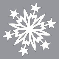 a white snowflake on a gray background with stars in the middle and bottom