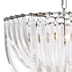 a glass chandelier hanging from the ceiling