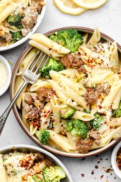 pasta with meat and broccoli served in bowls