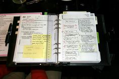 an open planner book with notes on it