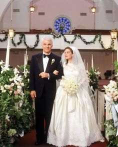 an older man and woman are standing in front of the alter at their wedding ceremony