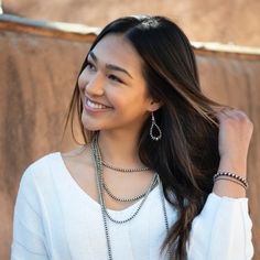 Our Desert Pearls are an homage to the sterling silver Navajo beads found throughout classic Southwestern jewelry. Whereas the traditional Navajo beads are handmade by Navajo artists, the silver pearls in our Desert Blossom collection are handcrafted and strung by our local Navajo and Non Navajo jewelers in house. Choose between high polish and rustic patina, or mix and match to bring together the old and the new. Sterling Silver Earrings 2" long 5mm and 7mm beads Handcrafted in New Mexico, USA Silver Jewelry With Dangling Beads, Sterling Silver Teardrop Beaded Earrings, Southwestern Style Teardrop Dangle Earrings, Sterling Silver Earrings With Dangling Beads, Southwestern Nickel-free Teardrop Earrings, Beaded Jewelry For Everyday Use, Silver Jewelry With Dangling Beads For Everyday, Elegant Everyday Beaded Earrings, Southwestern Style Silver Beaded Dangle Jewelry