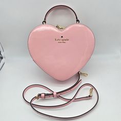 Brand: Kate Spade Style: Patent Leather Love Shack Heart Crossbody / Kg154 Condition: New With Tag Exterior Color: Tea Rose Interior Features: Three Credit Card Slots Closure: Zipper Hardware Color: Gold Straps: One Top Handle And One Crossbody/Shoulder Strap Approx. Measurements: 8" L X 7" H X 2.5" W No Lowball Offers Or Trades Please. I Do Not Discuss Prices On Listings. Thank You For Looking! Kate Spade Pink Bag For Gift, Pink Kate Spade Bag As A Gift, Pink Kate Spade Bag As Gift, Kate Spade Aesthetic, Tea Rose Color, Rose Interior, Kate Spade Minnie Mouse, Heart Purse, Kate Spade Style