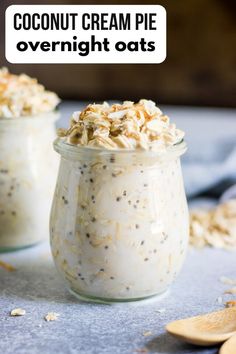 two jars filled with oatmeal sitting on top of a table