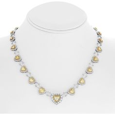 Celebrate the art of fine craftsmanship in the ethereal embrace of our Floating Heart Yellow Diamond Necklace. Picture this: a radiant 18K gold necklace that delicately cradles 7.79 carats of heart-shaped yellow diamonds, each gem whispering tales of eternal sunshine. The magic lies in its unique floating design, where the heart-shaped diamonds seem to dance freely, casting a golden glow that captures the very essence of a sunbeam.But that's not all – behold the enchanting halo that surrounds this heart's desire. A mesmerizing fusion of white and yellow accent diamonds forms a double halo, enhancing the necklace with an unparalleled sparkle, akin to stars illuminating a twilight sky. Imagine the necklace resting gently against your skin, each diamond a reminder of your inner radiance, a ce Yellow Diamond Necklace, Twilight Sky, Yellow Diamonds, 18k Gold Necklace, Golden Glow, Eternal Sunshine, Double Halo, Yellow Accents, Heart Shaped Diamond