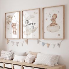 three framed pictures hang on the wall above a wooden bench with pillows and pillow cases