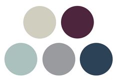 four different shades of gray, white and blue are arranged in the shape of circles