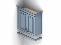 a blue cabinet with two doors and one drawer on the wall next to a white wall