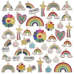 a bunch of charms with different colors and designs on them, including hearts, rainbows,