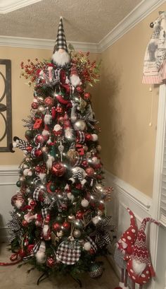 a decorated christmas tree in a living room