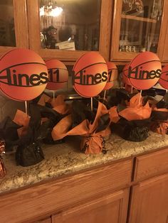 an assortment of basketballs and candy on a counter with the word minnesota in black