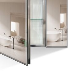 a bathroom with two mirrors and a bathtub in the middle one has a glass door