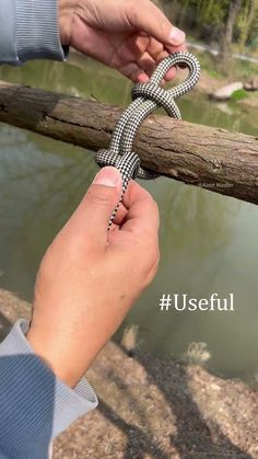 a person holding onto a rope that is attached to a tree branch with the caption useful