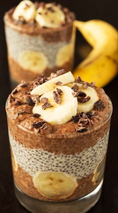 two desserts with banana slices and chocolate chips on top are sitting next to each other