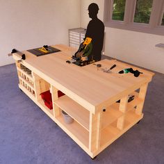 a workbench with a man working on it in the middle of an empty room