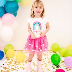 The Magical Rainbow Tutu for kids is fun skirt to celebrate being magical! Wear for that special celebration, or every day for a magical touch! Customers love Sweet Wink tutus because the tulle is super soft and doesn't scratch or itch little ones. Another great feature of Sweet Wink tutus is that the embellishments on the tutus don't "shed." You'll never have to worry about glitter trailing all over your house!Item Description:-Pink tulle embellished with multi-color sequins-Pink cotton lining- Playful Rainbow Tutu Dress For Spring, Playful Sequin Summer Dress, Rainbow Playful Tutu Dress For Dress-up, Playful Rainbow Tutu Dress For Dress-up, Rainbow Tutu Dress For Birthday In Spring, Playful Rainbow Tulle Tutu Dress, Rainbow Skirt For Spring Party, Gold Tutu, Pink Tulle Skirt