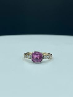 This is a beautiful 2.72 carat natural pink sapphire & diamond platinum + 14k yellow gold ring that is size 8.5. The cushion cut pink sapphire is approximately 2.36 carats and it is top quality. The diamonds are VS clarity and G color, weighing approximately 0.36 carats. This ring is not stamped, however it has been acid tested and is guaranteed to have a platinum bezel along with a solid 14k gold shank. Sapphire is the gemstone associated with September. This ring would be a fabulous engagement Yellow Gold Earring, Fine Jewelry Collection, Yellow Gold Ring, Sapphire Diamond, Cushion Cut, Pink Sapphire, Yellow Gold Rings, Solid 925 Sterling Silver, Ring Verlobung