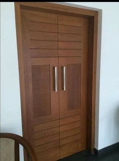 an open wooden door in a room