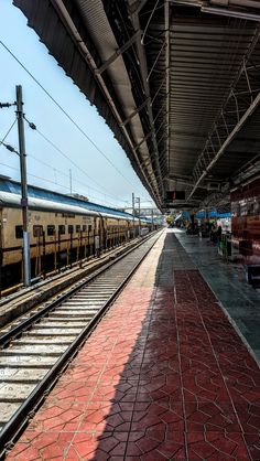 the train is pulling into the station to pick up passengers