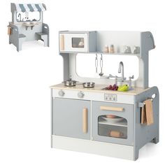 a child's play kitchen set with sink, stove and oven