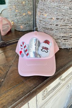 Christmas Things Hat Pink Hat Sugar Stitch/Faire Pink Novelty Winter Hats, Casual White Hat For Holiday, Casual White Holiday Hat, Winter Trucker Hat With Short Brim, Trendy Short Brim Hats As Gifts, Candy Cane Heart, Women Trucker, Santa Candy, Shipping Packages