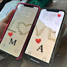 two iphones that have hearts on them