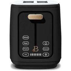 an image of a toaster that is black and white with gold trimmings