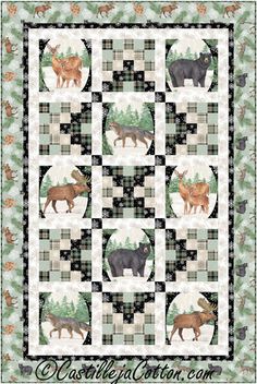 a quilted wall hanging with animals on it