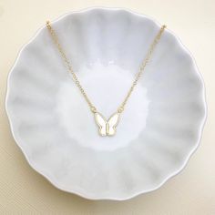 This beautiful mother of pearl and gold plated Butterfly pendant necklace is a perfect piece to incorporate gold into your everyday, casual style. Our quality hand-crafted bar necklaces are handmade with love and care and one at a time. ENTER OUR SHOP HERE for more beautiful jewelry : https://www.etsy.com/shop/MillyStreet Thank you for shopping with Milly Street! PLEASE READ OUR POLICIES https://www.etsy.com/shop/MillyStreet?ref=l2-shopheader-name#policies PLEASE READ OUR PRODUT CARE https://www Bar Necklaces, Butterfly Nature, Necklace Butterfly, Nature Necklace, Butterfly Pendant Necklace, Mother Of Pearl Necklace, One At A Time, Butterfly Necklace, Butterfly Pendant