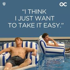 two men lounging on lounge chairs in an indoor swimming pool with the caption i think i just want to take it easy