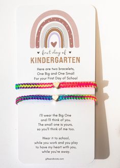 a rainbow bracelet with a poem written on it and a white card attached to it