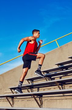 a man is running down some steps