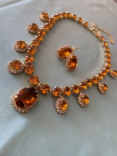 "TOPAZ Crystal STATEMENT Necklace by Lady Detalle 16k gold plated gorgeous sparkly TOPAZ crystal stones Victorian Necklace, Georgian Paste Jewelry LIMITED EDITION, there is just ONE of these available! This gorgeous TOPAZ necklace is truly a unique necklace fit for upper class impressions, fancy occasions, or royalty or nobility of the English, French or European court and will work for multiple eras as extant versions of similar necklaces were seen in portraits for hundreds of years: stunning a Dazzling Gold Rhinestone Necklace For Formal Occasions, Dazzling Gold Crystal Necklaces For Parties, Gold Sparkling Crystal Necklace For Party, Dazzling Gold Crystal Necklace For Party, Gold Crystal Costume Jewelry Sets, Elegant Gold Crystal Rhinestone Necklace, Gold Rhinestone Jewelry Sets For Party, Gold Crystal Jewelry Sets With Jeweled Details, Elegant Gold Rhinestone Necklace With Sparkling Stones