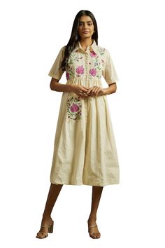 Off white dress embroidered with multicolored kashmiri aari on front yoke, embroidered pocket on one side and gathered waist embroidered. - Aza Fashions Summer Straight Kurta Dress With Multicolor Embroidery, Summer Multicolor Embroidered Straight Kurta, Festive Cotton Dress With Floral Embroidery, Straight Kurta With Multicolor Intricate Embroidery, Cotton Kurta With Floral Embroidery And Short Sleeve, Short Sleeve Cotton Kurta With Floral Embroidery, Festive Multicolor Embroidered Cotton Dress, Embroidered Short Sleeve Dress For Festive Occasions, Cream Short Sleeve Dress With Floral Embroidery