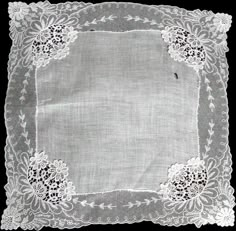 New old stock vintage wedding hanky with a fancy applique and lace border. Although never used, this hanky is slightly imperfect. Please view all photos, as you will see a couple of very small tears in the lace and a small tear in the linen center. Still very pretty, and perfect for a bride-to-be as her something old. All white, measuring 11 inches, and made of linen. Being sold AS IS, and priced accordingly. White Victorian Handkerchiefs With Lace Trim, White Victorian Handkerchief With Lace Trim, Victorian White Handkerchiefs With Lace Trim, Lace Handkerchiefs With Lace Trim For Wedding, Lace Wedding Handkerchiefs With Lace Trim, Vintage Lace Trim Handkerchiefs For Wedding, Vintage Wedding Handkerchiefs With Lace Trim, Lace Wedding Handkerchiefs With Lace Work, Wedding Lace Handkerchief With Lace Work