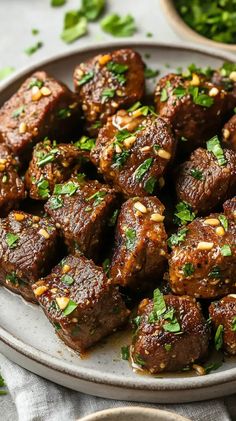 meatballs with herbs and seasoning on a plate