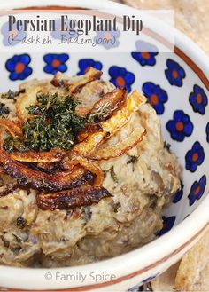 a close up of a bowl of food on a table