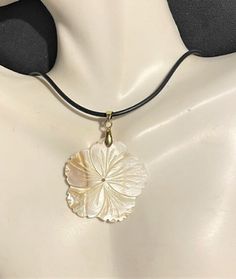 "White  Mother of Pearl Flower Pendant Necklace , Abalone Necklace, White Shell Pendant Necklace  Pendant is 2 \" Long with the connector bale x 1 1/4\" wide. 18\" cord + 2\" extension Please know that due to the shell , they are not exactly the same. There may be a little more of tan on parts of the shell or a little less. Please check through my other listings ! If you have any questions, feel free to ask as I do not accept returns ! Thank You for stopping by" Shell Pendant Necklace, Big Pendant Necklace, Real Flower Necklace, Dope Jewelry Accessories, Etsy Jewellery, Abalone Necklace, Mother Of Pearl Necklace, Dope Jewelry, Flower Pendant Necklace